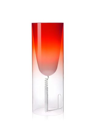 Rote Kartell Toobe Tischleuchte aus transparentem Kunststoff mit spiralförmigem Kabel für stimmungsvolle Beleuchtung.